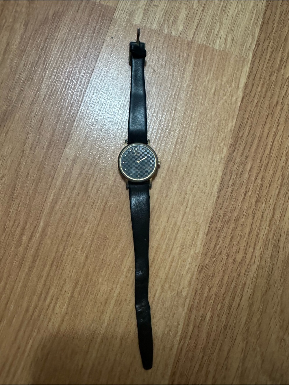 Pulsar by Seiko quartz watch with checkered background